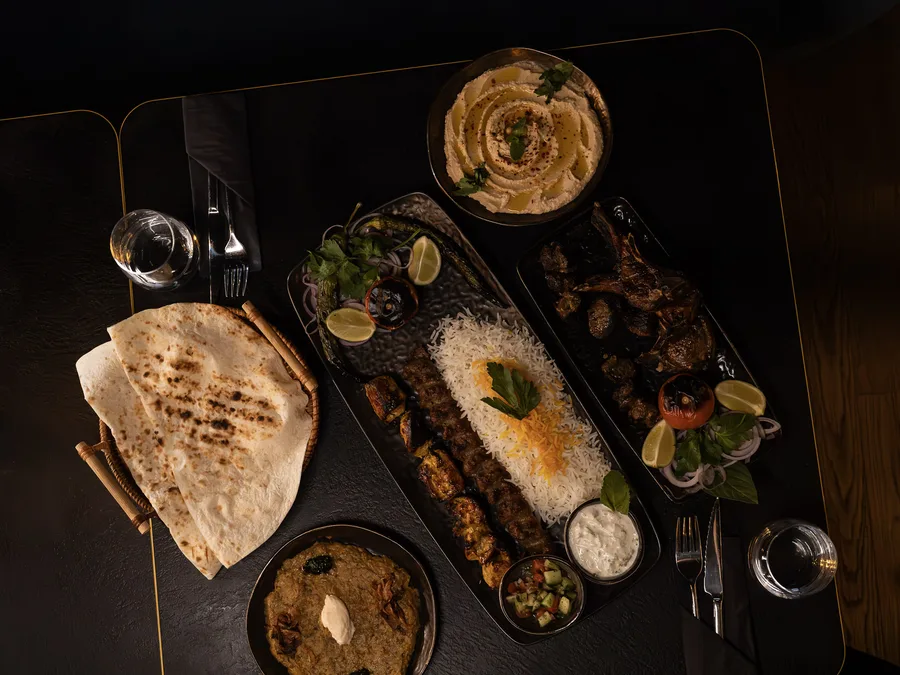 Grill skewers with saffron rice and naan bread